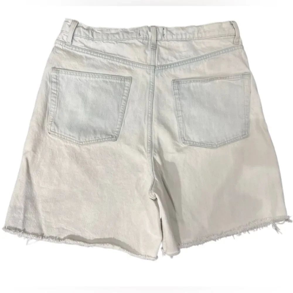 Free People We The Free high waist cut off style light wash denim Size 31